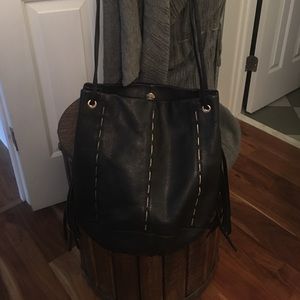 Leather bag with fringe